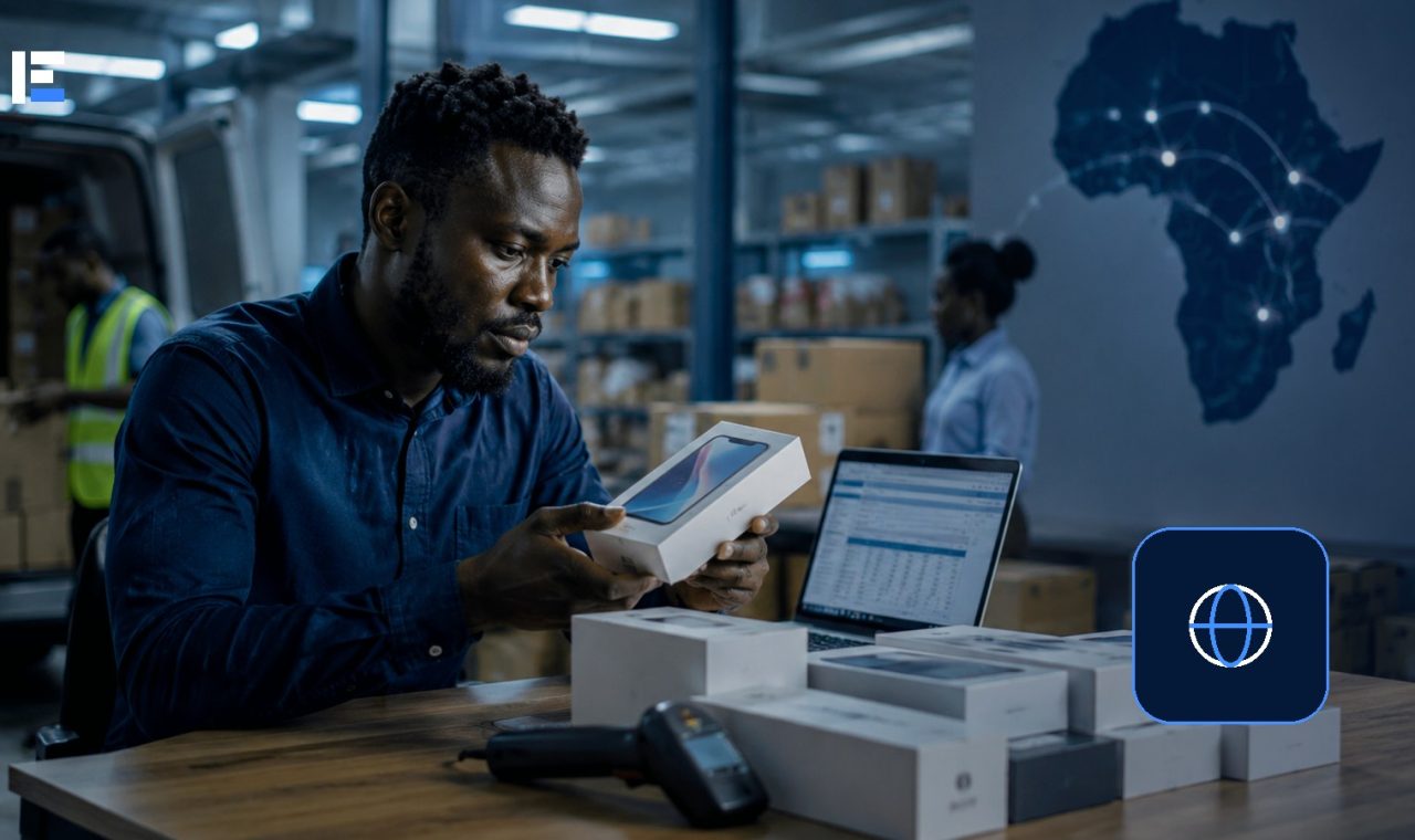 A technology logistics worker checking smartphone inventory beside a map of Africa