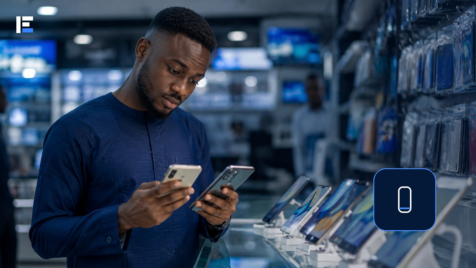 A shopper comparing two smartphones in a Nigerian electronics store