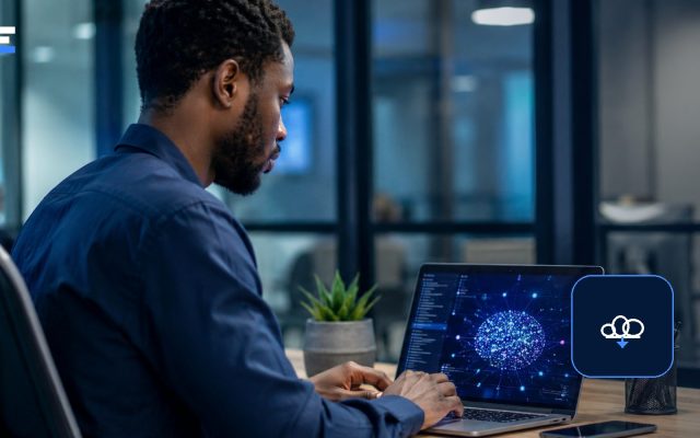 An African professional using cloud-connected business software on a laptop
