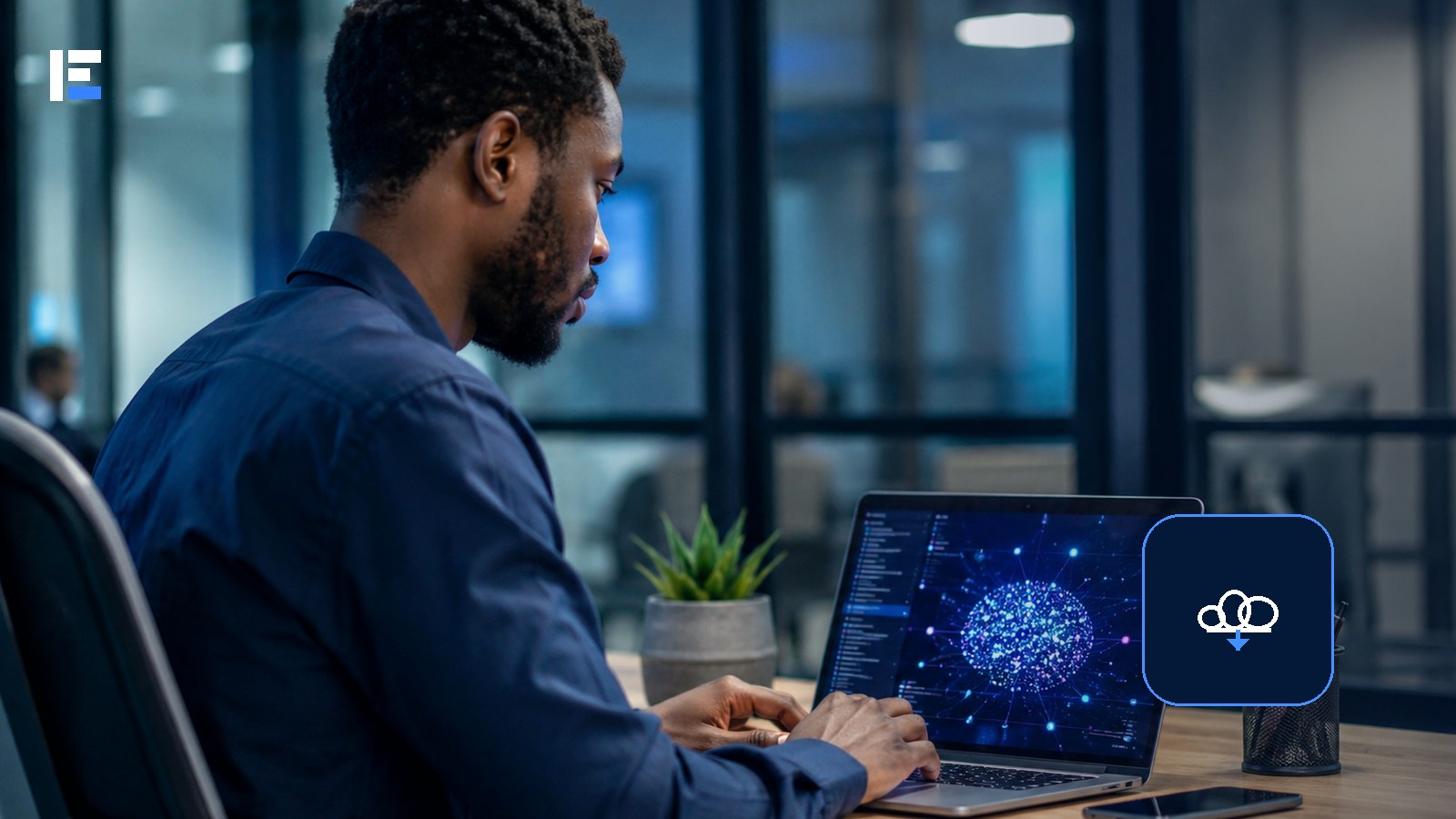 An African professional using cloud-connected business software on a laptop