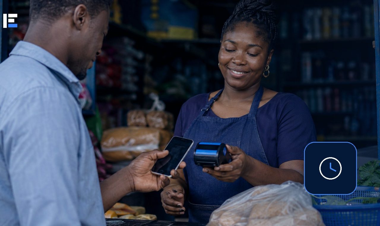 A Nigerian customer checking a delayed digital payment at a small business