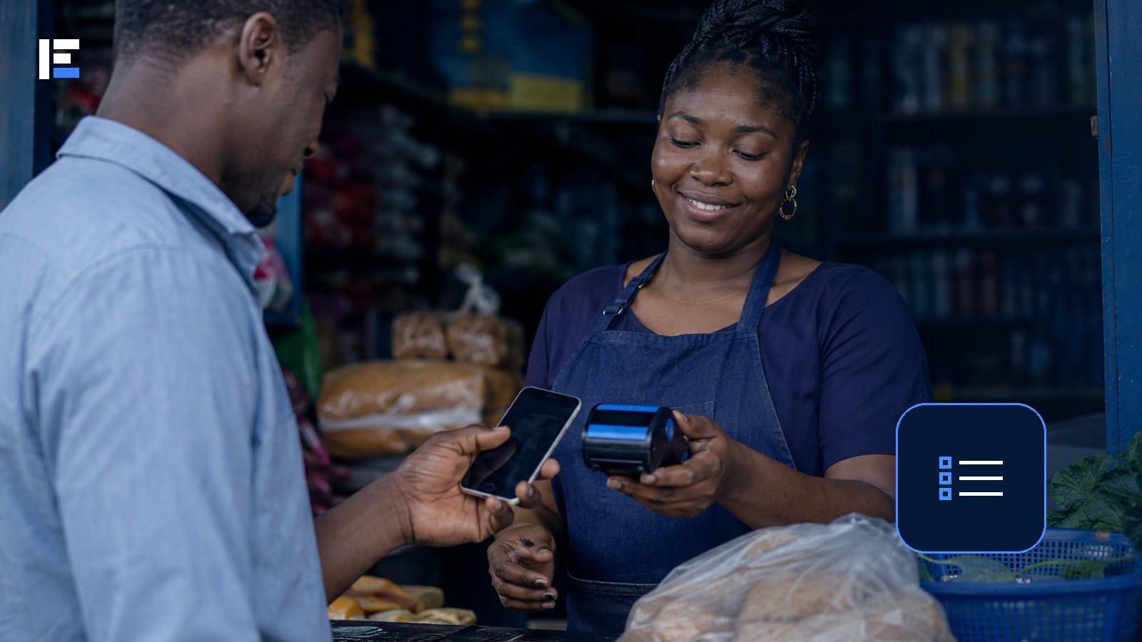 A Nigerian small-business owner reviewing software options during a digital payment